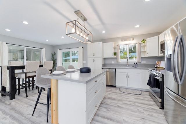15-2804 Maikoiko St, Pahoa, HI 96778 - kitchen featuring stainless steel appliances, open shelves, a sink, light countertops, and recessed lighting
