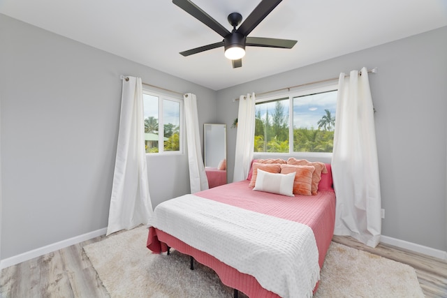 15-2804 Maikoiko St, Pahoa, HI 96778 - bedroom with wood finished floors, baseboards, and ceiling fan