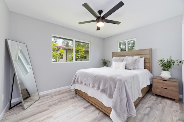 15-2804 Maikoiko St, Pahoa, HI 96778 - bedroom with wood finished floors, baseboards, and a ceiling fan