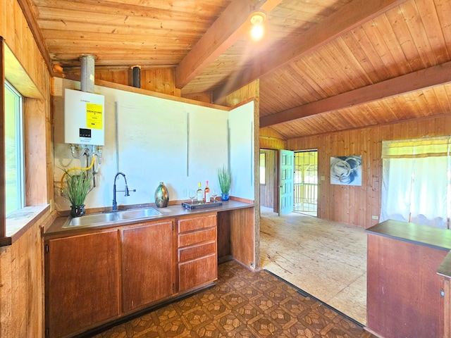 13-3403 Kumakahi St, Pahoa, HI 96778 - kitchen with water heater, wood walls, a wood ceiling with exposed beams, brown cabinetry, and light countertops
