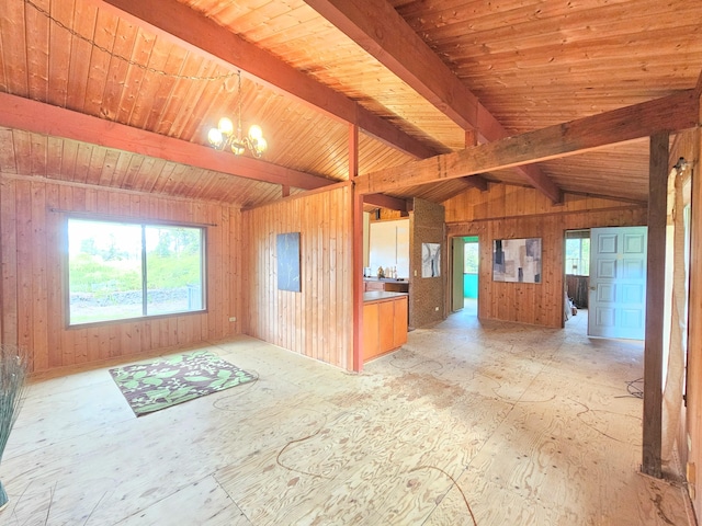 13-3403 Kumakahi St, Pahoa, HI 96778 - unfurnished living room featuring healthy amount of natural light, a chandelier, and wooden walls