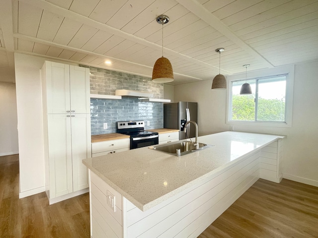 94-6707 Kamaoa Rd, Naalehu, HI 96772 - kitchen with appliances with stainless steel finishes, a sink, wood finished floors, white cabinets, and wooden ceiling with exposed beams