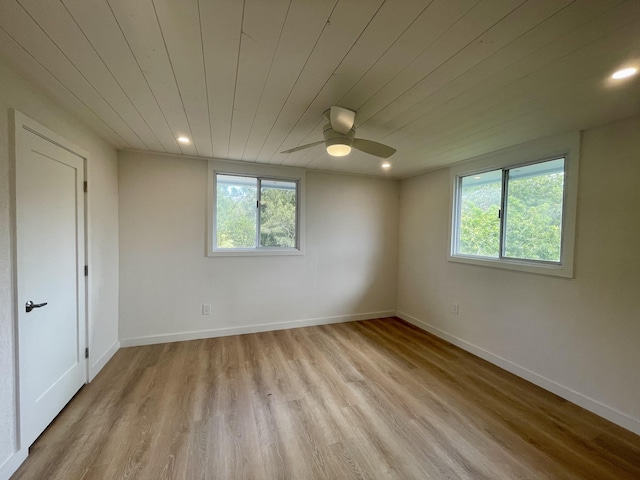 94-6707 Kamaoa Rd, Naalehu, HI 96772 - empty room featuring healthy amount of natural light, wood ceiling, light wood-style flooring, ceiling fan, and recessed lighting