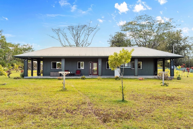 16-2028 35th Ave, Keaau, HI 96749 - view of front of property with a front yard and metal roof
