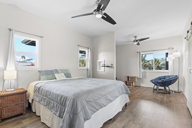 16-2028 35th Ave, Keaau, HI 96749 - bedroom featuring wood finished floors and ceiling fan