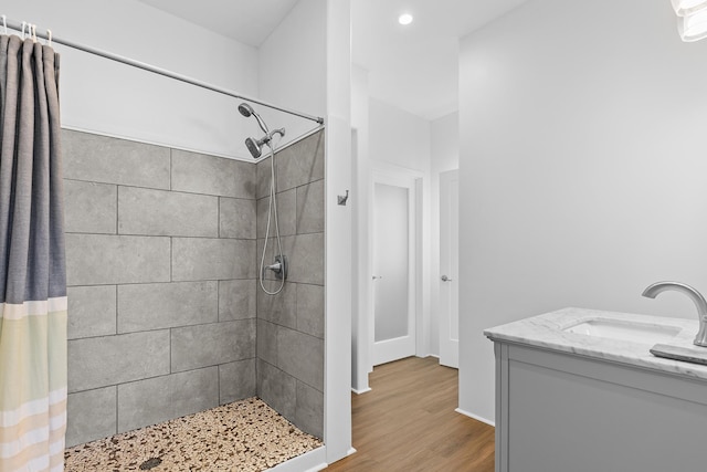 16-2028 35th Ave, Keaau, HI 96749 - full bathroom featuring tiled shower, vanity, wood finished floors, and recessed lighting