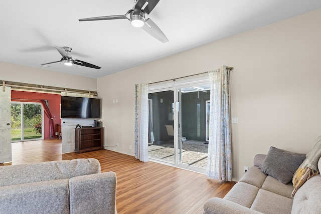 16-2028 35th Ave, Keaau, HI 96749 - living room with a ceiling fan and wood finished floors