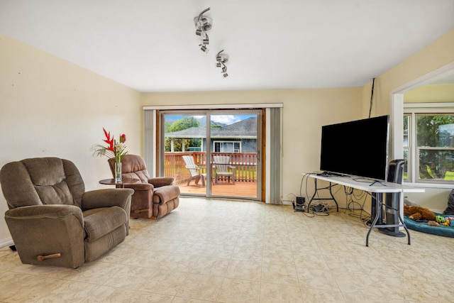 242 Koili Ln, Kapaa, HI 96746 - living area with plenty of natural light and rail lighting