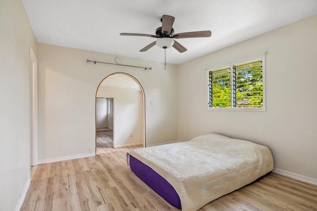 242 Koili Ln, Kapaa, HI 96746 - bedroom with light wood-type flooring, baseboards, and a ceiling fan