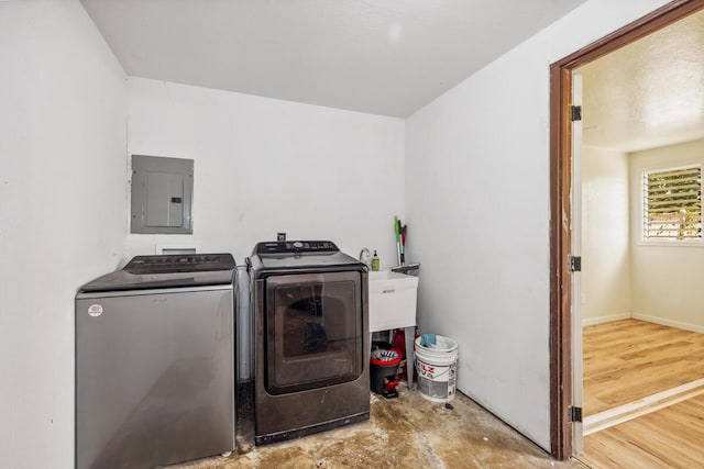 242 Koili Ln, Kapaa, HI 96746 - washroom with electric panel and washer and dryer