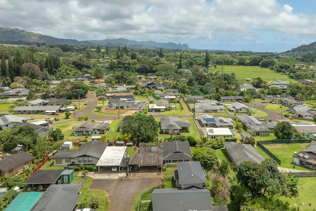 242 Koili Ln, Kapaa, HI 96746 - aerial perspective of suburban area featuring a mountain backdrop