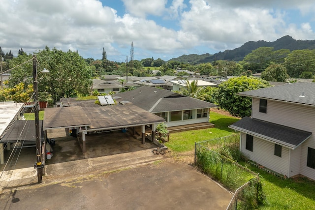242 Koili Ln, Kapaa, HI 96746 - aerial perspective of suburban area with a mountainous background