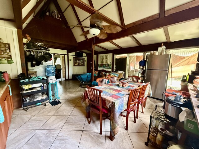 16-233 Orchid Land Dr, Keaau, HI 96749 - dining area with light tile patterned floors and ceiling fan