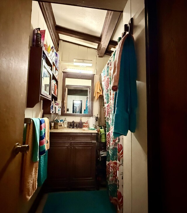 16-233 Orchid Land Dr, Keaau, HI 96749 - bathroom with vanity and beam ceiling