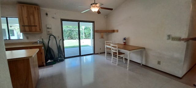 16-1397 35th Ave, Keaau, HI 96749 - kitchen featuring a ceiling fan, lofted ceiling, brown cabinetry, and light countertops