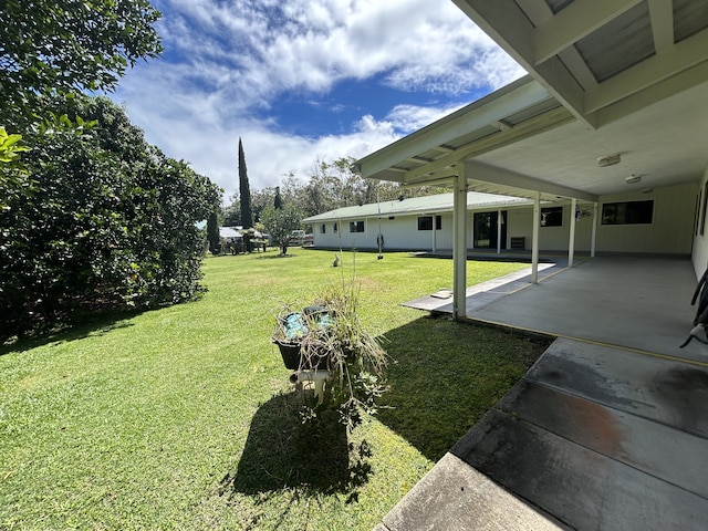 16-1397 35th Ave, Keaau, HI 96749 - view of grassy yard featuring a patio area