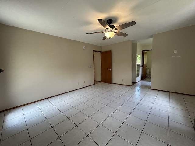 16-1397 35th Ave, Keaau, HI 96749 - unfurnished room featuring ceiling fan, light tile patterned flooring, and baseboards