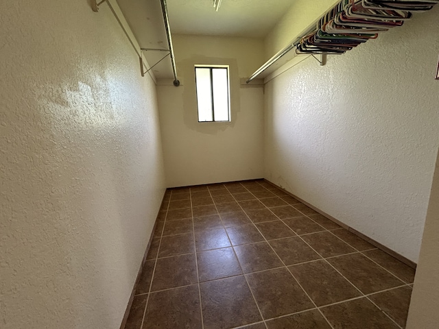 16-1397 35th Ave, Keaau, HI 96749 - walk in closet with dark tile patterned floors