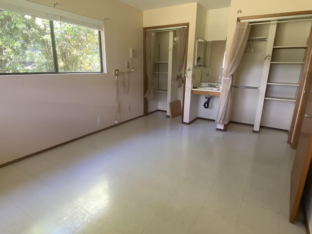16-1397 35th Ave, Keaau, HI 96749 - unfurnished bedroom with baseboards