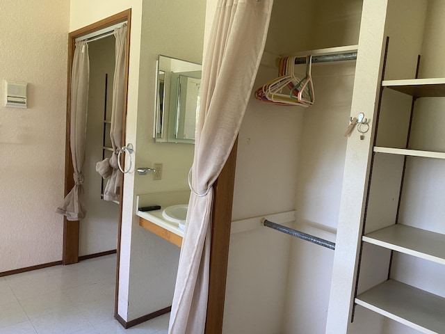 16-1397 35th Ave, Keaau, HI 96749 - spacious closet featuring tile patterned floors