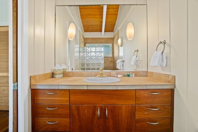 7205 Alealea Rd, Hanalei, HI 96722 - bathroom with vanity and wooden ceiling with exposed beams