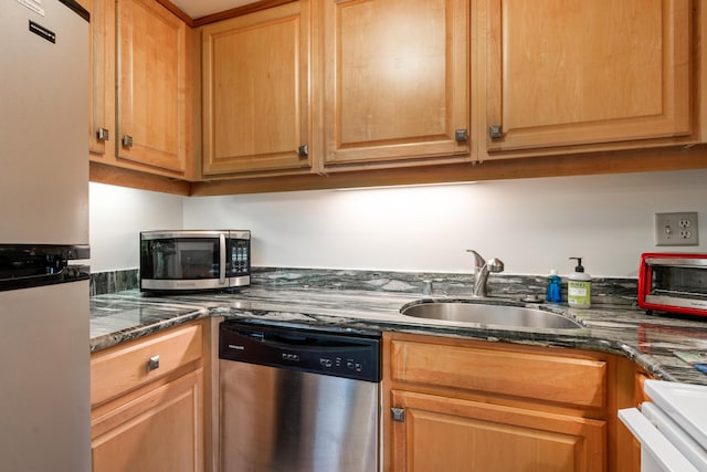 75-5719 Alii Dr Unit 220, Kailua-Kona, HI 96740 - kitchen featuring stainless steel appliances, a sink, and dark stone counters
