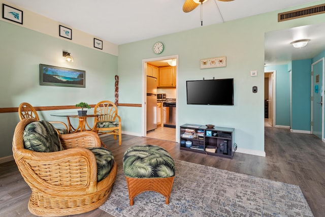 75-5719 Alii Dr Unit 220, Kailua-Kona, HI 96740 - living room with baseboards, wood finished floors, and a ceiling fan