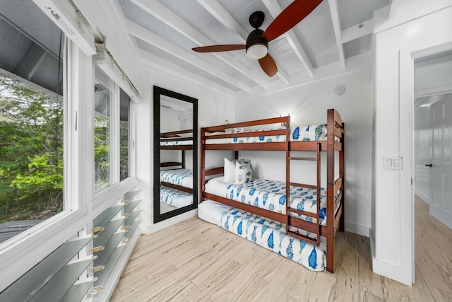 75-6150 Alii Dr Unit 7, Kailua-Kona, HI 96740 - bedroom featuring beam ceiling and wood finished floors