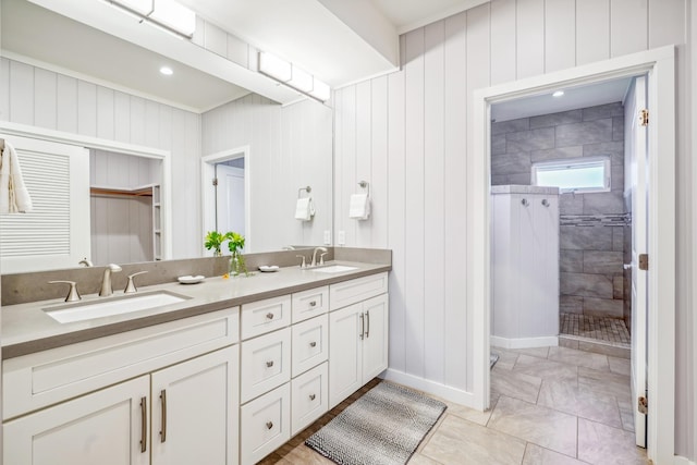 2650 Halalu St, Koloa, HI 96756 - full bathroom featuring double vanity, a walk in shower, and baseboards