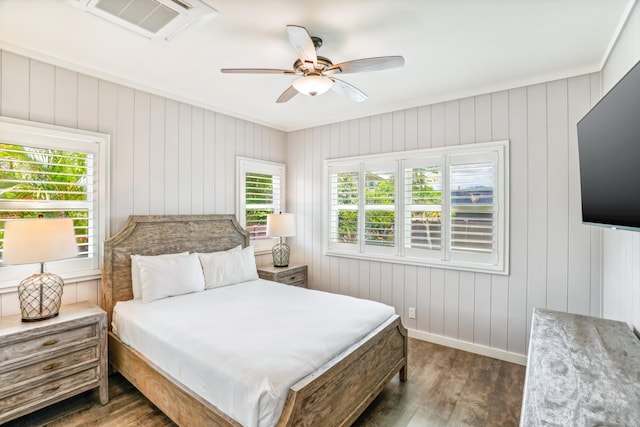 2650 Halalu St, Koloa, HI 96756 - bedroom featuring wood finished floors, baseboards, and ceiling fan