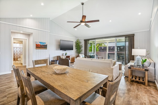 2650 Halalu St, Koloa, HI 96756 - dining room featuring wood finished floors, a ceiling fan, lofted ceiling, baseboards, and wooden walls