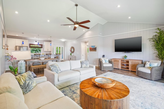 2650 Halalu St, Koloa, HI 96756 - living room with wood finished floors, ceiling fan, vaulted ceiling, and recessed lighting