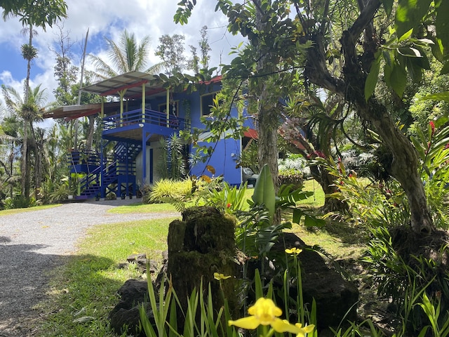 16-355 Melekule St, Kurtistown, HI 96760 - view of property exterior with stairs