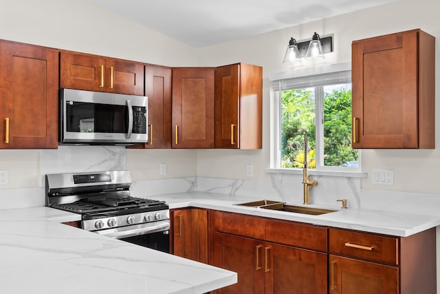 16-2168 Tree Fern Dr, Pahoa, HI 96778 - kitchen featuring stainless steel appliances, a sink, and light stone countertops