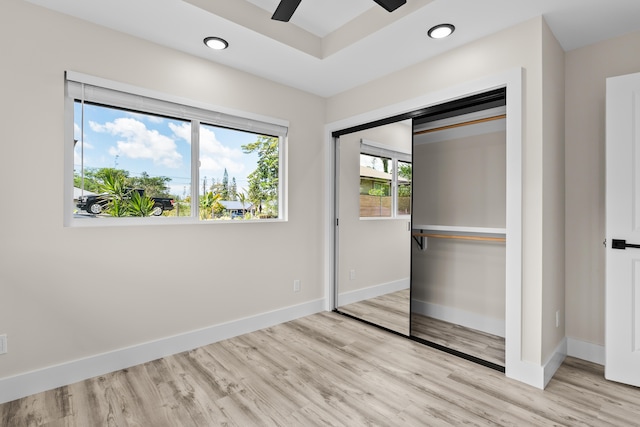 16-2168 Tree Fern Dr, Pahoa, HI 96778 - unfurnished bedroom featuring wood finished floors, baseboards, a closet, recessed lighting, and a ceiling fan