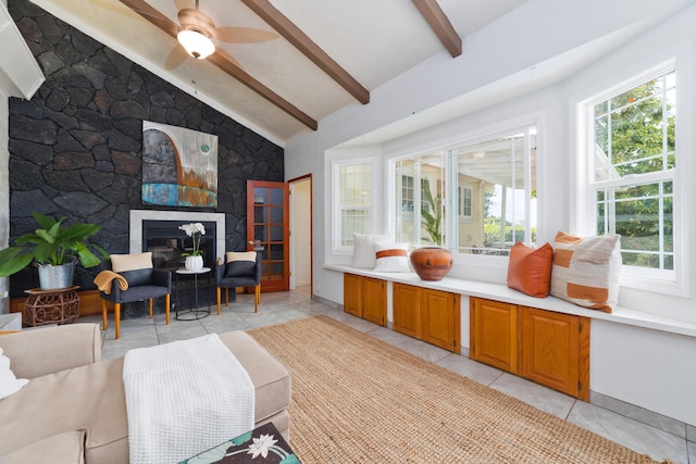 68-1884 Eha Ko Pl, Waikoloa, HI 96738 - living area featuring a large fireplace, light tile patterned floors, a ceiling fan, and baseboards