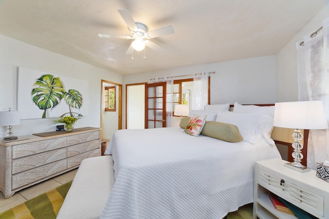 68-1884 Eha Ko Pl, Waikoloa, HI 96738 - bedroom with light tile patterned floors and ceiling fan