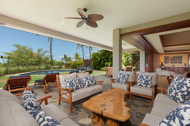 62-3512 Kaunaoa Lii Pl Unit 10B, Kamuela, HI 96743 - view of patio / terrace with outdoor lounge area, a ceiling fan, and an outdoor pool