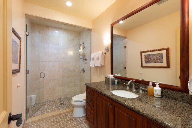 62-3512 Kaunaoa Lii Pl Unit 10B, Kamuela, HI 96743 - bathroom featuring vanity, toilet, a shower stall, recessed lighting, and tile patterned flooring