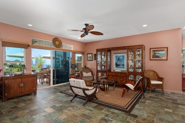 73-4685 Hina Lani St, Kailua-Kona, HI 96740 - living area featuring ceiling fan, stone tile floors, plenty of natural light, recessed lighting, and baseboards