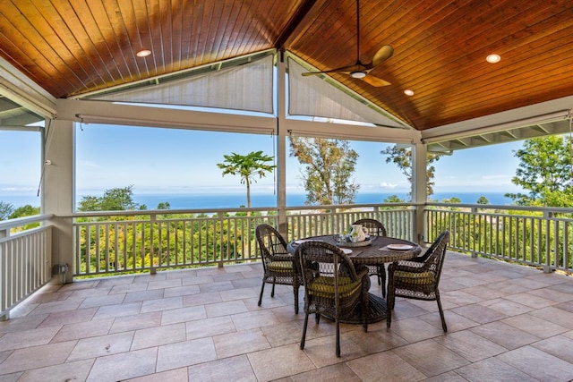 73-4566 Kukuki St, Kailua-Kona, HI 96740 - view of patio / terrace with ceiling fan, outdoor dining space, and a water view