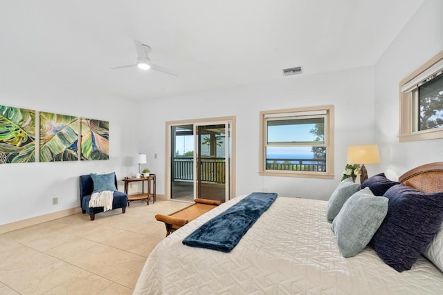 73-4566 Kukuki St, Kailua-Kona, HI 96740 - bedroom featuring multiple windows, light tile patterned floors, a ceiling fan, and access to outside