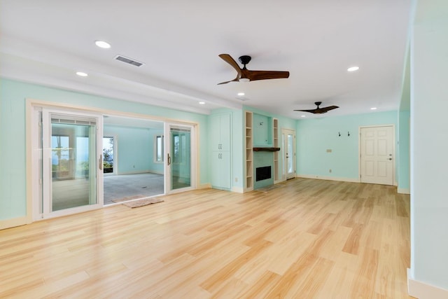 73-4566 Kukuki St, Kailua-Kona, HI 96740 - unfurnished living room featuring recessed lighting, ceiling fan, and light wood-style floors