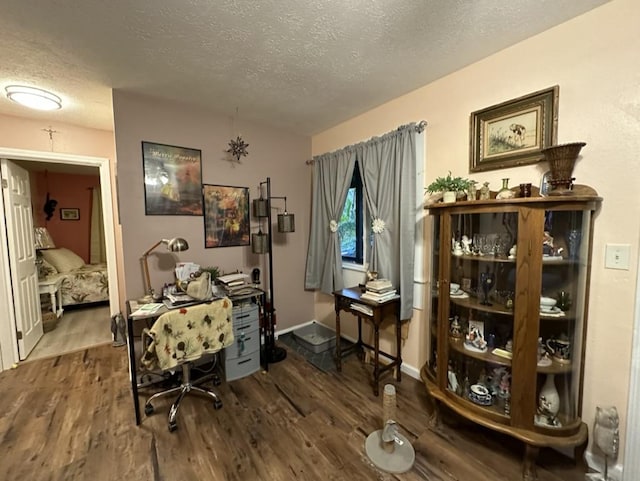 14-682 Kehau Rd, Pahoa, HI 96778 - office area with a textured ceiling, dark wood-type flooring, and baseboards