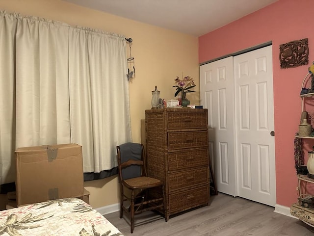 14-682 Kehau Rd, Pahoa, HI 96778 - bedroom featuring wood finished floors, a closet, and baseboards