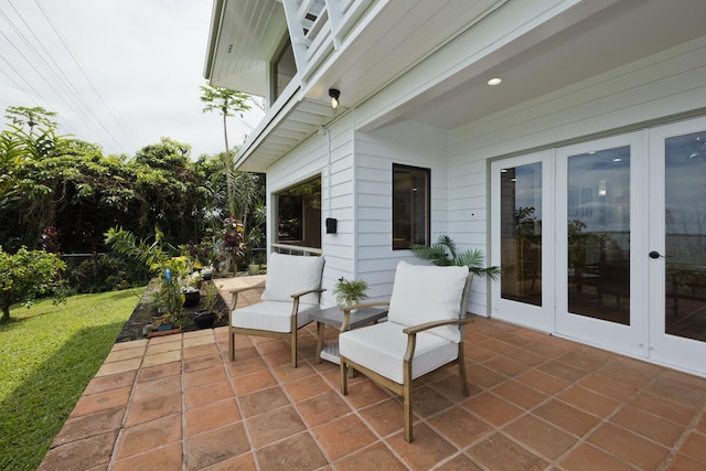 724-B Wainaku St, Hilo, HI 96720 - view of patio / terrace featuring french doors