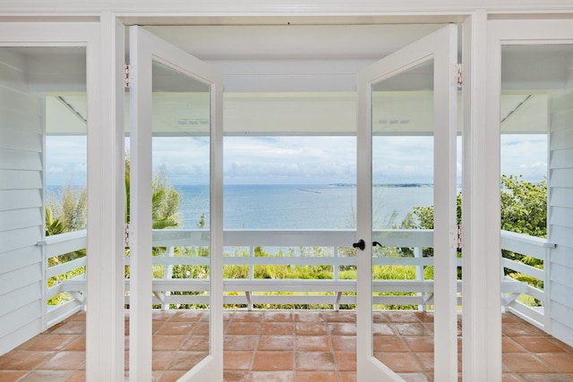 724-B Wainaku St, Hilo, HI 96720 - unfurnished sunroom featuring plenty of natural light and a water view
