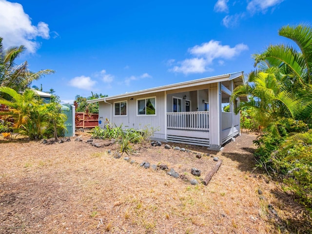 12-7038 Kehauopuna St, Pahoa, HI 96778 - rear view of property with covered porch