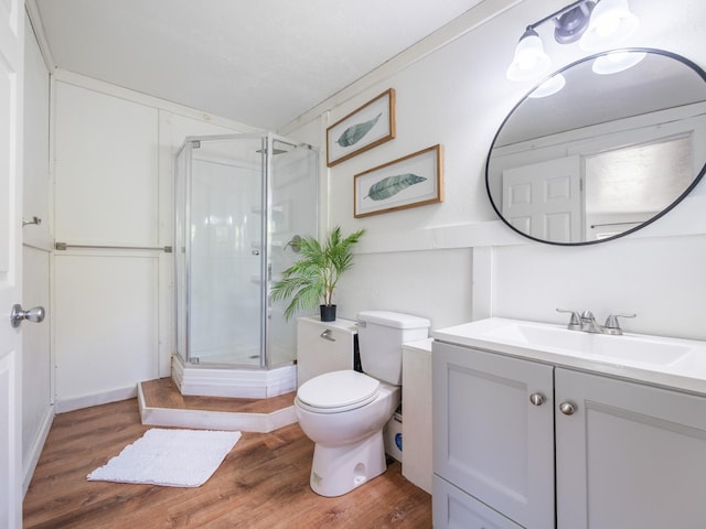 12-7038 Kehauopuna St, Pahoa, HI 96778 - full bath with vanity, a shower stall, toilet, and wood finished floors