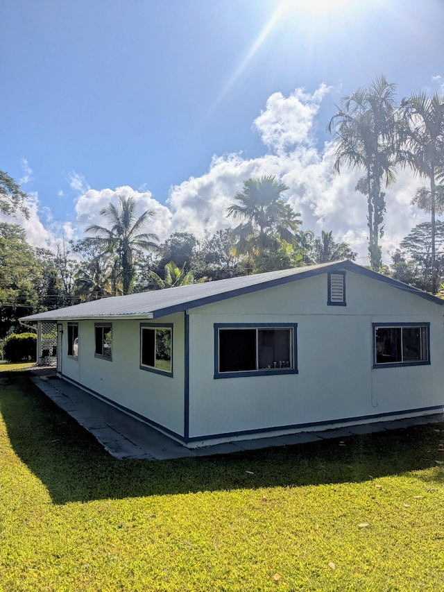 15-2714 Nenue St, Pahoa, HI 96778 - view of side of property featuring a yard